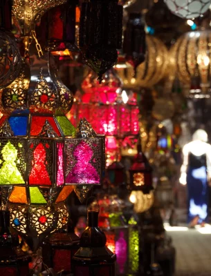 Colorful fanoos lamps in a shop.