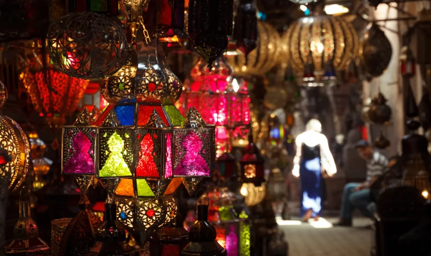 Colorful fanoos lamps in a shop.