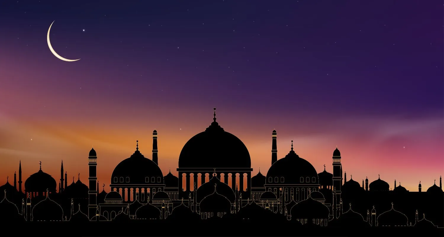 Sunset over a mosque skyline, symbolizing the peaceful end of a day during Eid.